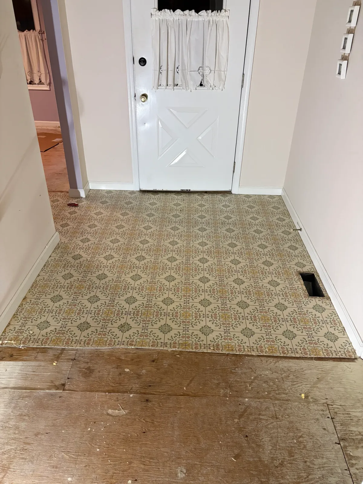 Entryway LVP Flooring and Custom Trim, before