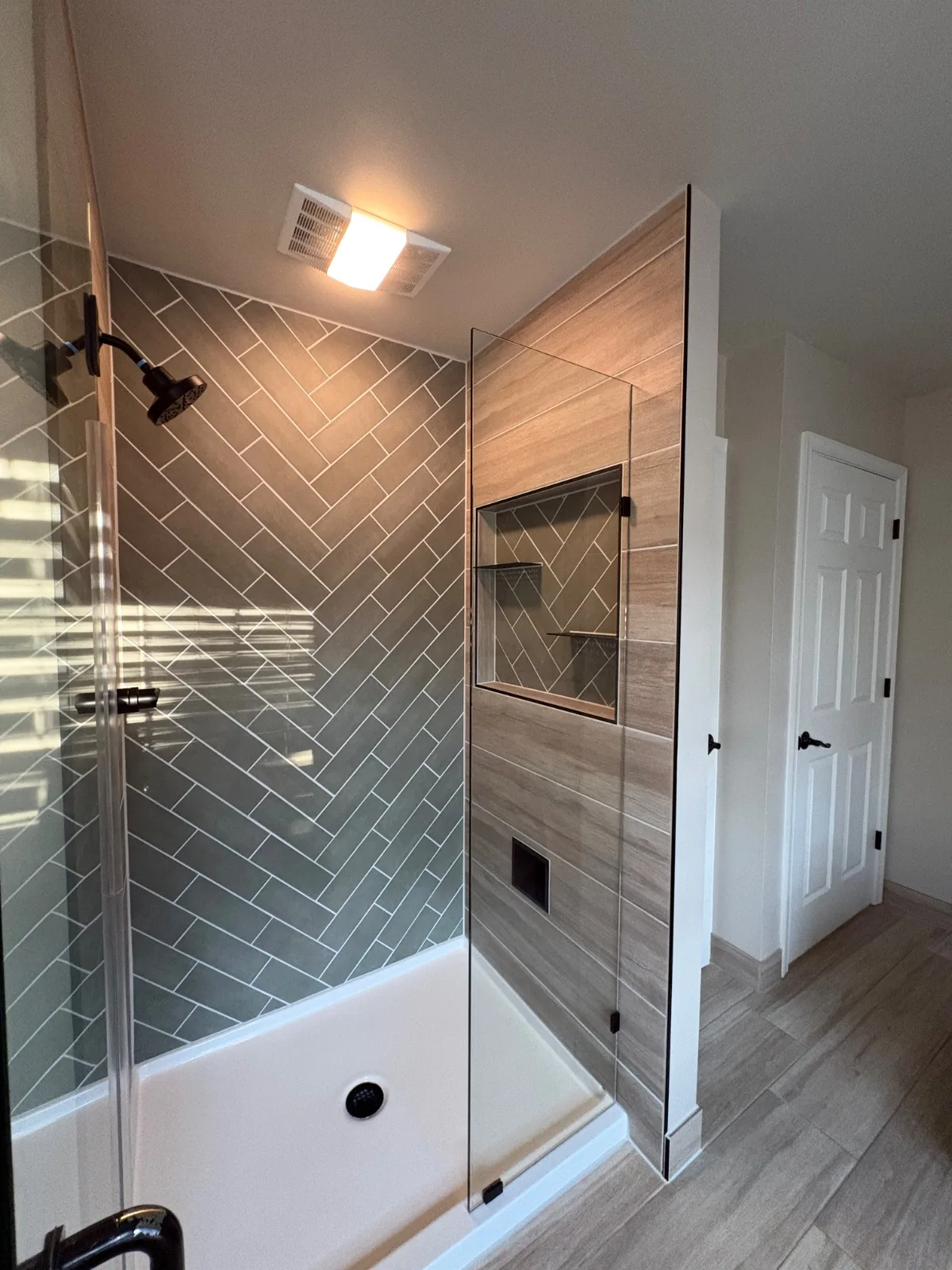 Custom Herringbone Shower Rebuild